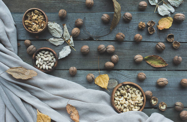 assorted nuts and autumn leaves