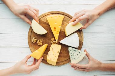 hands holding cheese clipart