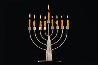 hanukkah celebration with menorah and candles clipart