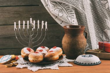 traditional jewish menorah, Kippah and donuts clipart