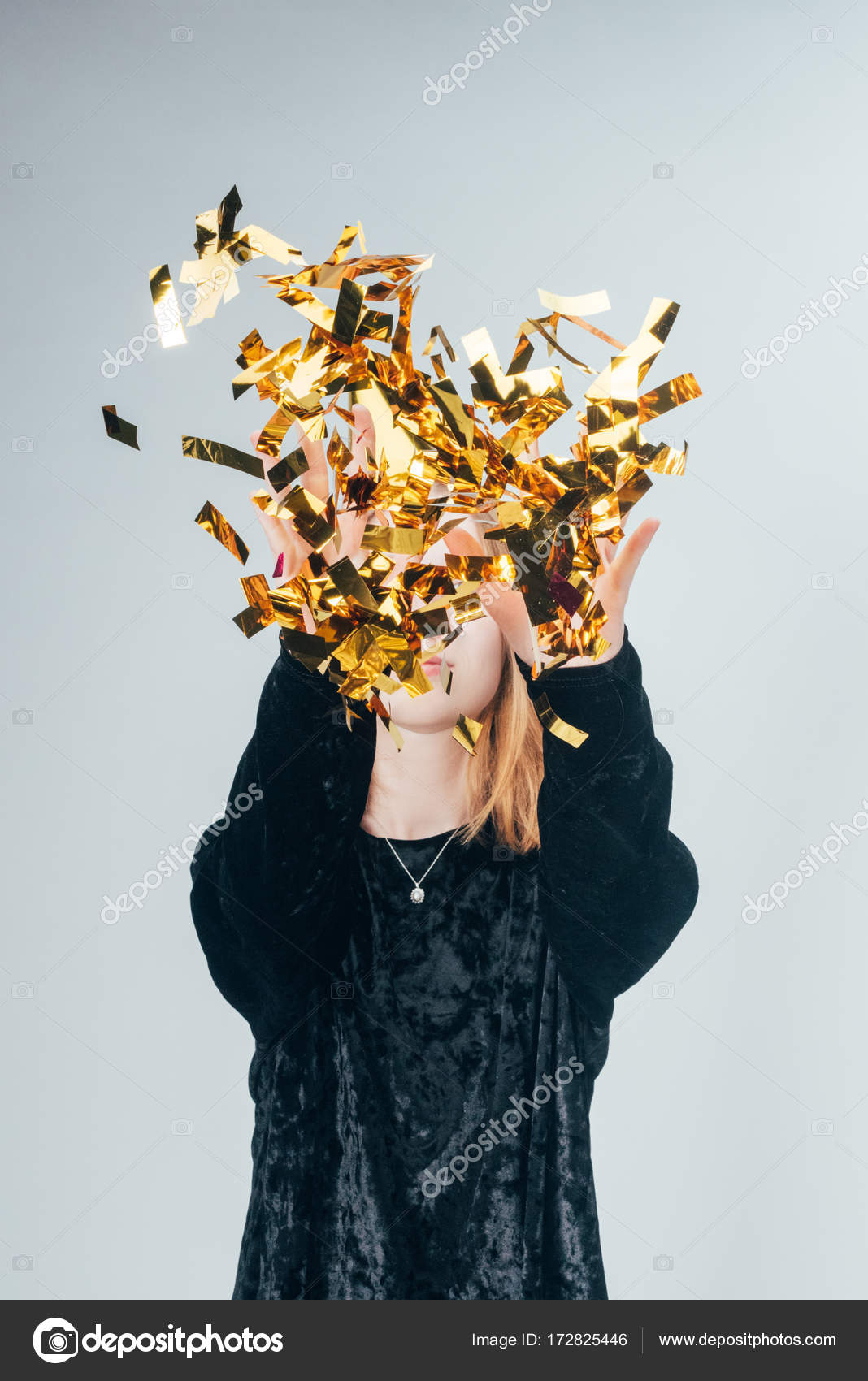 Woman throwing up confetti — Stock Photo © VadimVasenin 172825446