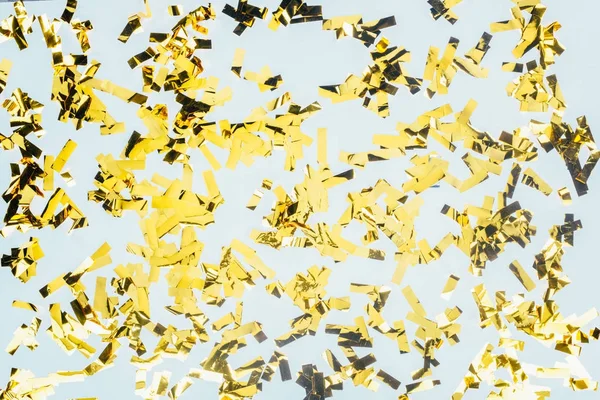 Zlaté lesklé konfety — Stock fotografie