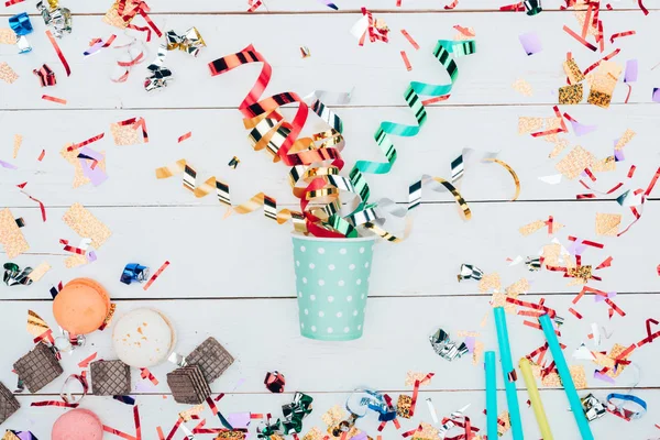 Paper cup with confetti — Stock Photo, Image