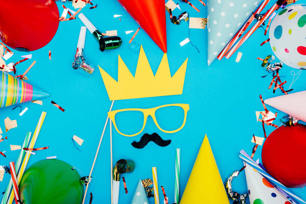 face with crown made of holiday decor