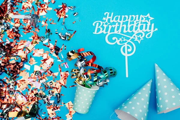 Confetti with paper cup and party hats — Stock Photo, Image