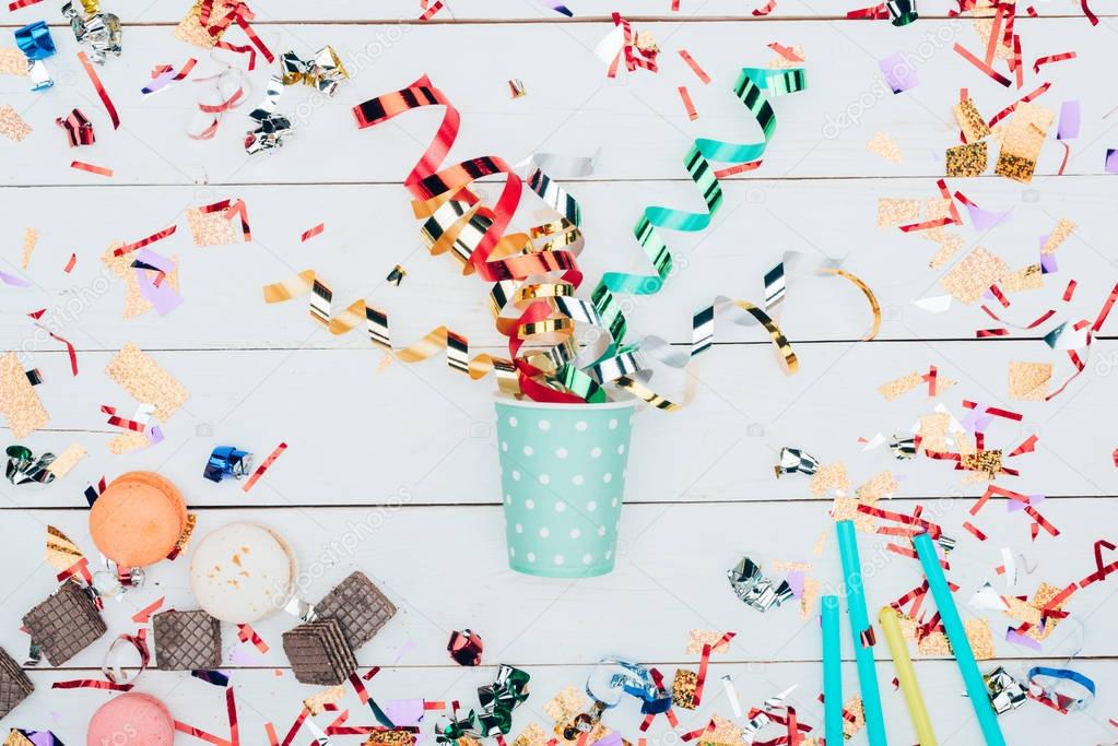 paper cup with confetti