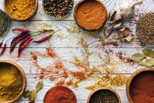 scattered spices and glasses with spices