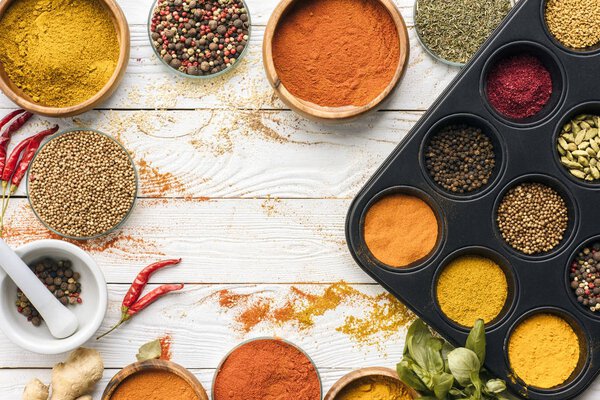 scattered spices and glasses with spices