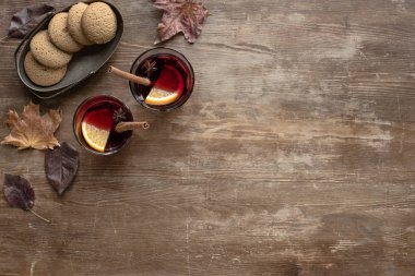glasses with mulled wine and cookies clipart