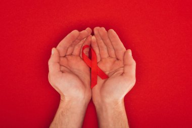 AIDS şerit ile el