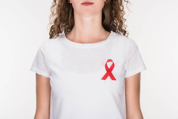 woman with red aids ribbon