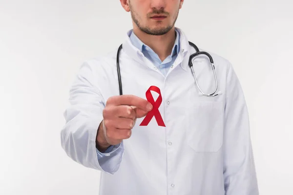 Doctor with aids ribbon — Stock Photo, Image