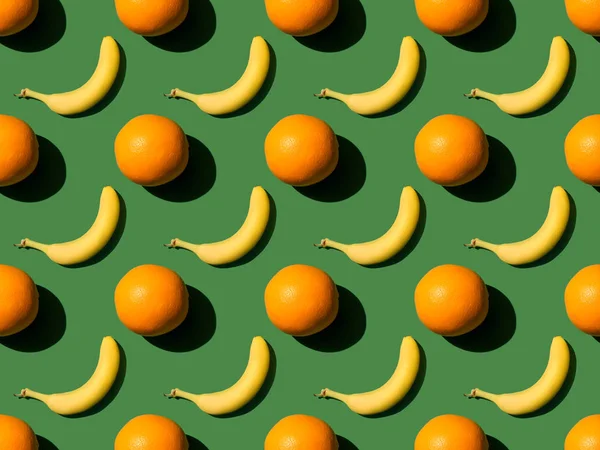 Oranges and bananas pattern — Stock Photo, Image