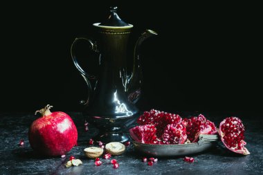 Black teapot and pomegranates   clipart