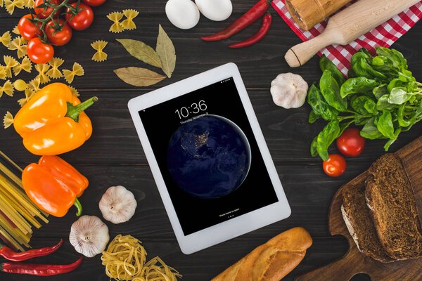 digital tablet and fresh ingredients