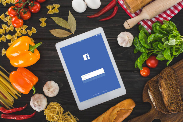 digital tablet and fresh ingredients