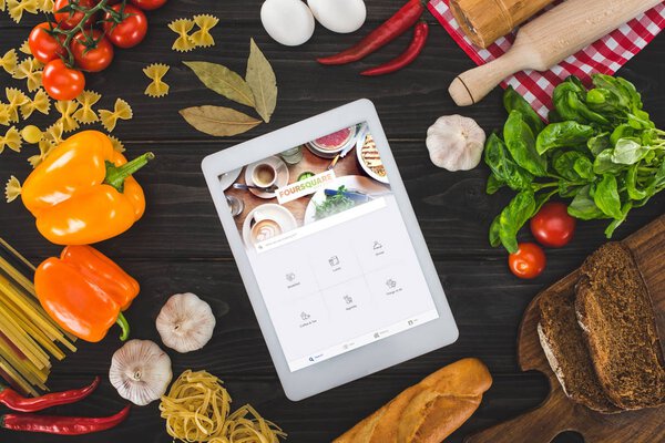 digital tablet and fresh ingredients