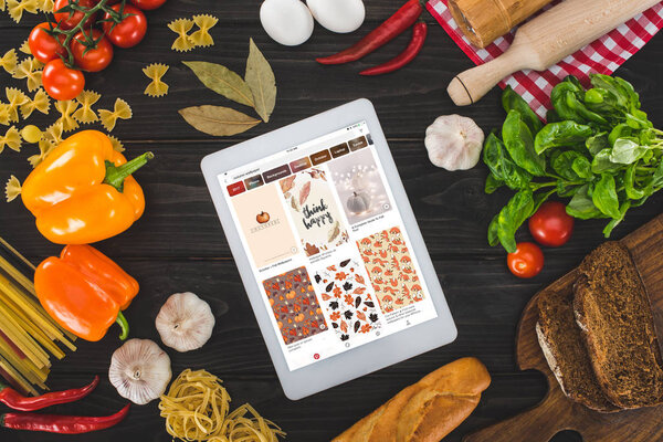 digital tablet and fresh ingredients