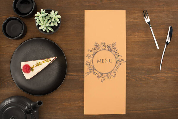 tea set, menu and dessert