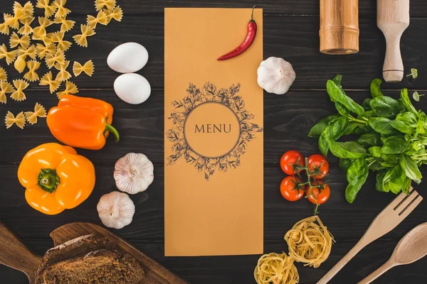 Restaurant menu and ingredients — Stock Photo, Image