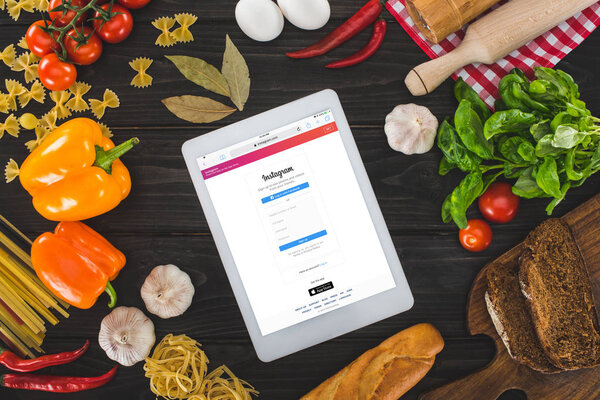 digital tablet and fresh ingredients