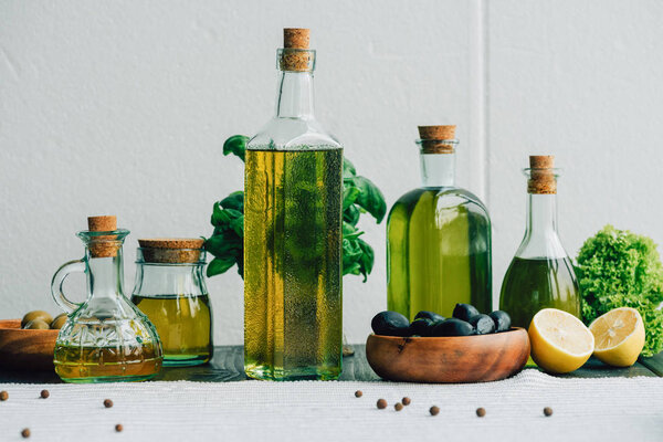 olive oil bottles with vegetables