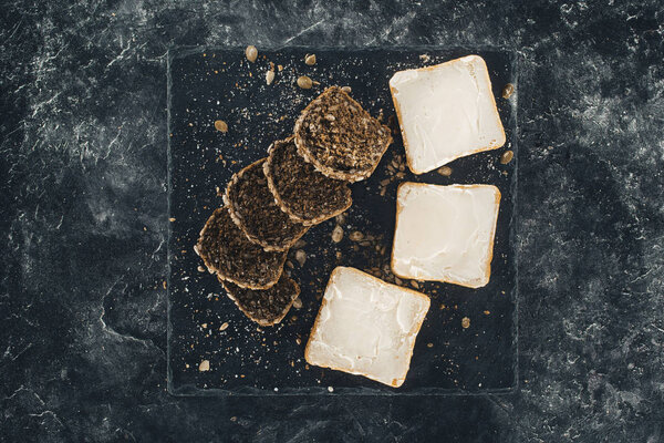 toasts with butter and multigrain bread   