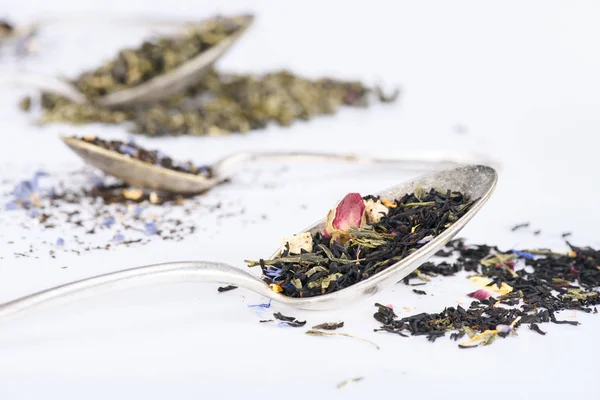 Herbal tea and spoons — Stock Photo, Image