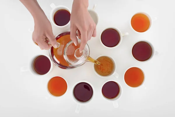 Person pouring tea — Stock Photo, Image