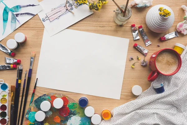 Empty sheet of paper and sketches — Stock Photo, Image