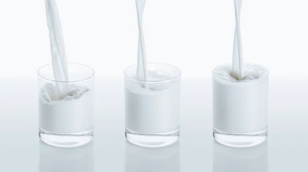 दूध तीन ग्लास में बह रहा है — स्टॉक फ़ोटो, इमेज