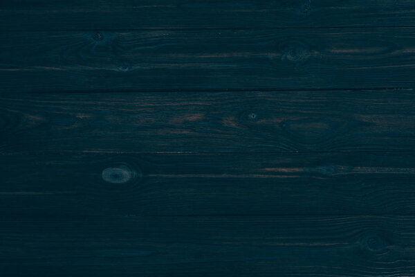 top view of dark rustic wooden background with horizontal planks