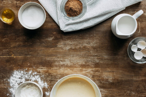 top view of fresh ingredients for pastry on wooden table