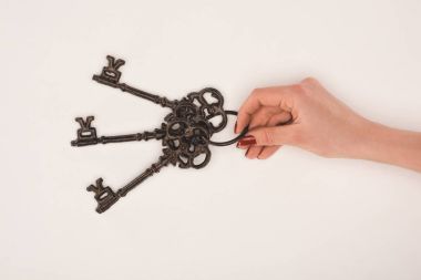 kadın el beyaz izole vintage tuşu tutmakta kırpılmış görüntü