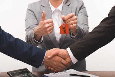 cropped image of costumer and estate agent shaking hands, realty buying concept isolated on white clipart