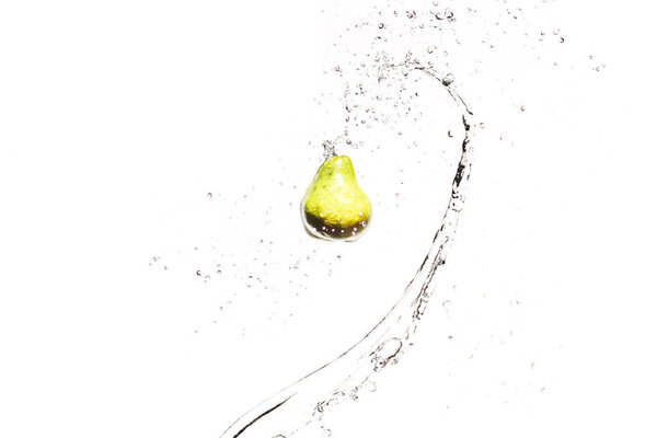 fresh ripe pear in water splashes isolated on white