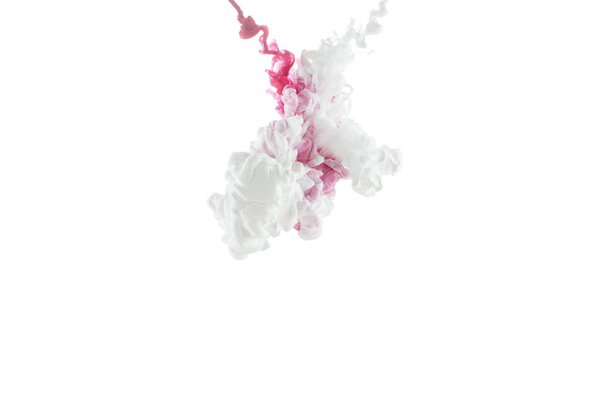 close-up view of pink paint splashes isolated on white