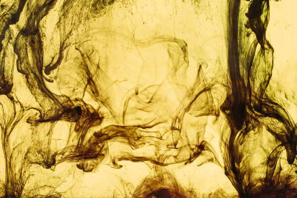 полная рамка из брызг желтой краски и завихрений
