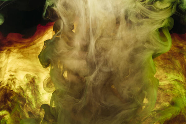 полная рамка из брызг желтой краски и завихрений
