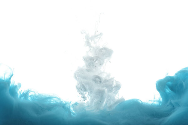 mixing of blue and white paint splashes isolated on white