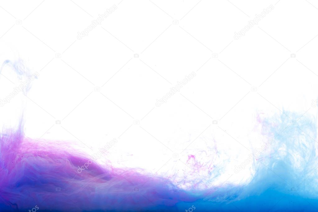 blue and purple paint in water, isolated on white