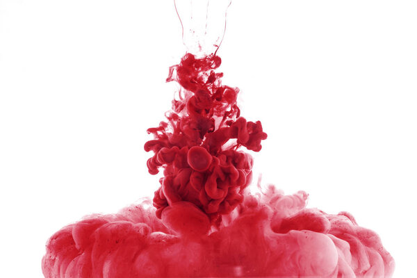 red paint splash in water, isolated on white