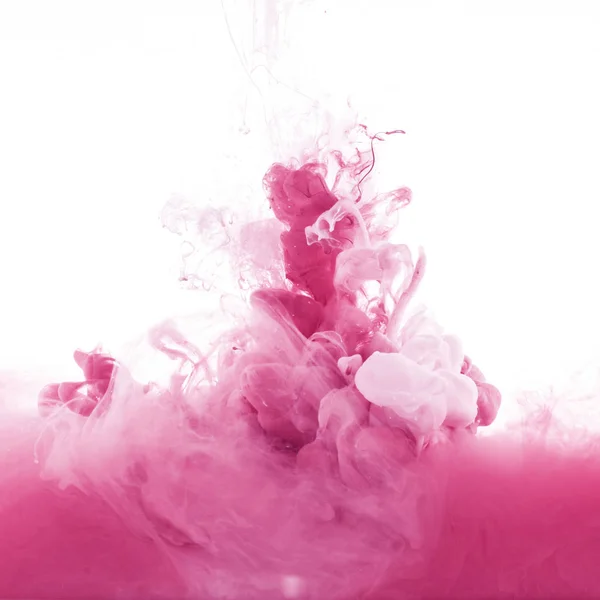 Vista Perto Salpicos Tinta Rosa Rosa Claro Água Isolado Branco — Fotografia de Stock