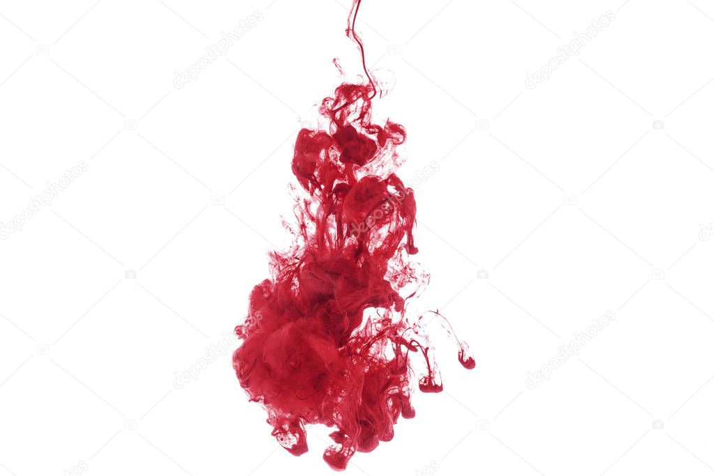 red paint splash in water, isolated on white with copy space