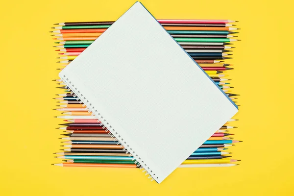 Top View Composition Colorful Pencils Blank Notebook Isolated Yellow Background — Stock Photo, Image