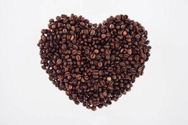 close-up view of heart made from roasted coffee beans isolated on white  clipart
