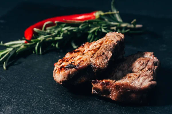 Close View Gourmet Grilled Steaks Rosemary Chili Pepper Black — Stock Photo, Image