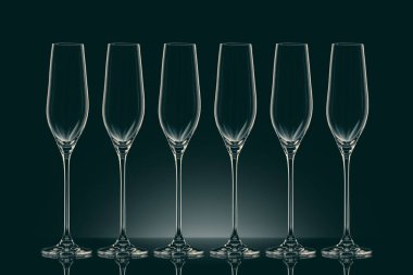 six empty clean glasses on black clipart
