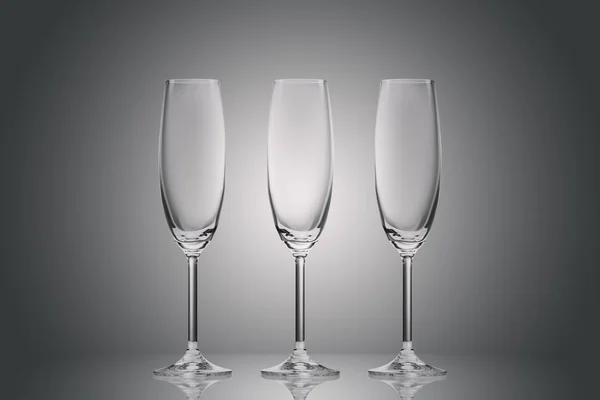 Drei Leere Saubere Gläser Auf Grau — kostenloses Stockfoto
