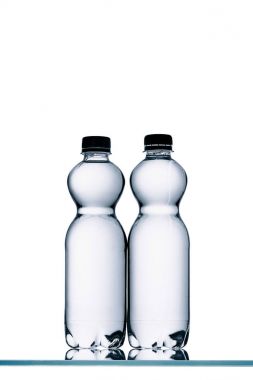 plastic bottles of water isolated on white